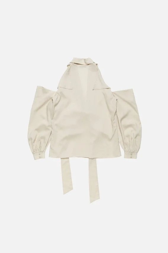 Blus med utskärningar och rosett - Bild 7