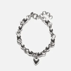 Halsband med hjärtberlock